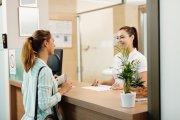 happy_woman_talking_to_receptionist_while_arriving_at_the_spa_1665942766.jpg